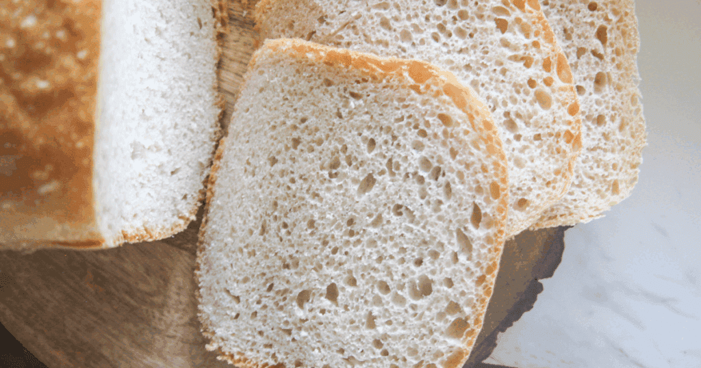 Freshly baked sourdough loaf with rustic texture from a bread machine