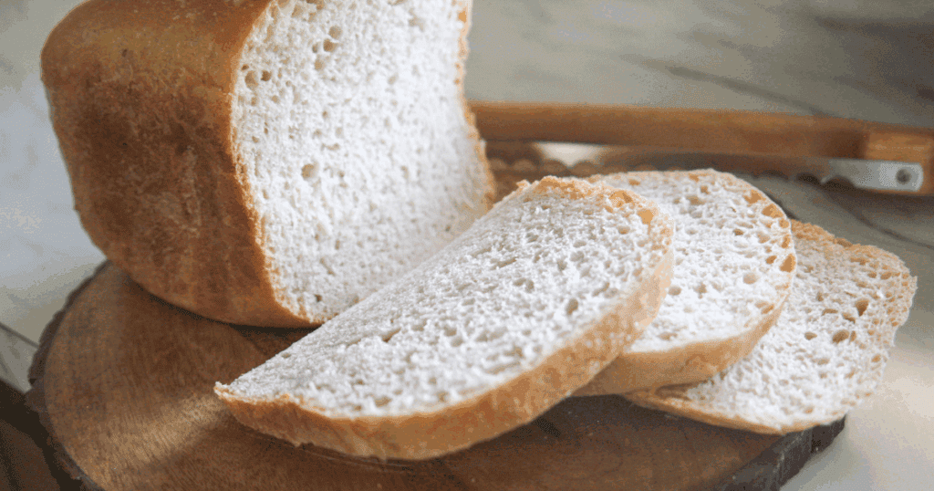 Close-up of finished sourdough bread showing airy crumb and crust