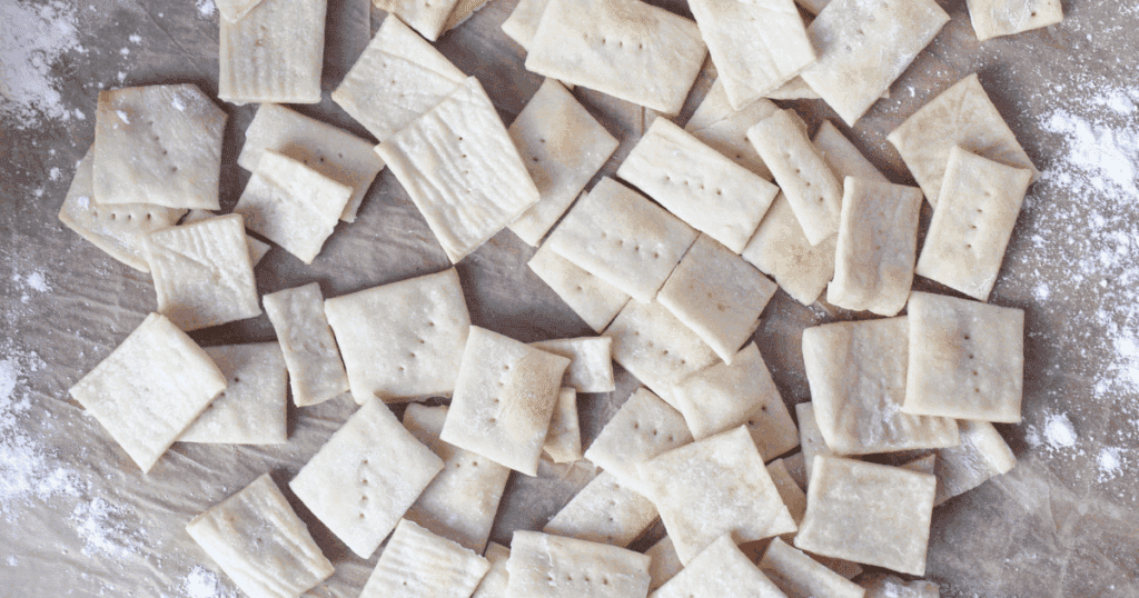 Sourdough Discard Crackers Pile of homemade sourdough discard crackers with golden brown edges