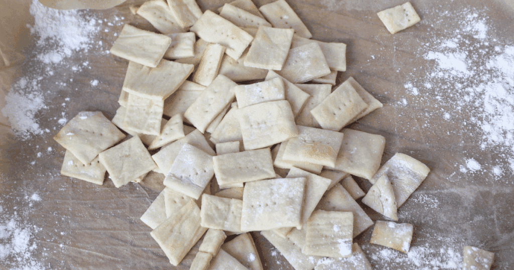 Sourdough Discard Crackers Overhead view of a full tray of sourdough discard crackers just out of the oven