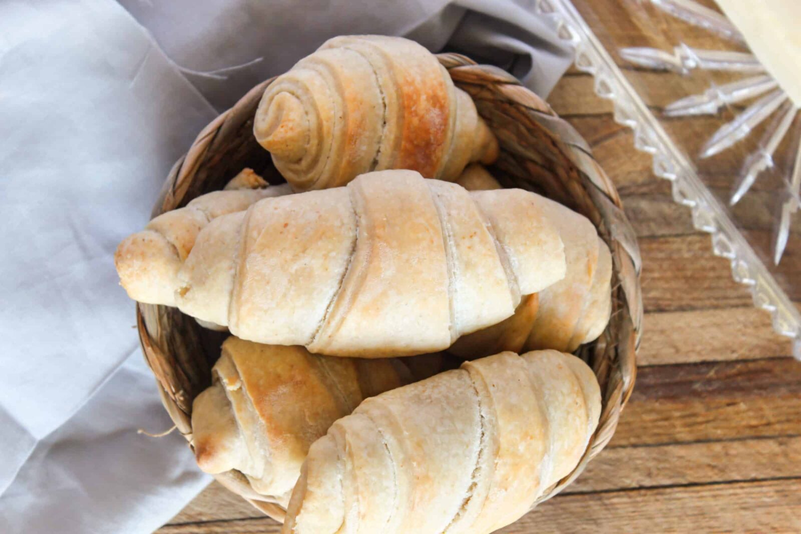 Golden flaky sourdough crescent rolls fresh from the oven