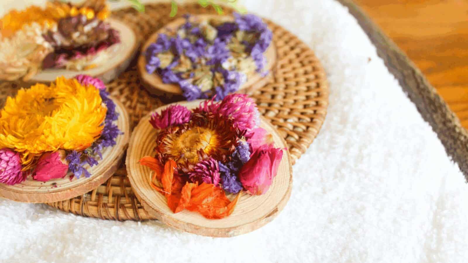 Wood slice Christmas ornament crafts featuring dried flowers