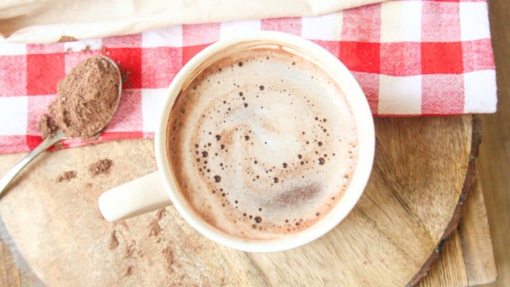 Homemade Hot Chocolate Mix (No Powdered Sugar!) Creamy homemade hot chocolate with swirls of cocoa, made from a simple homemade mix.
