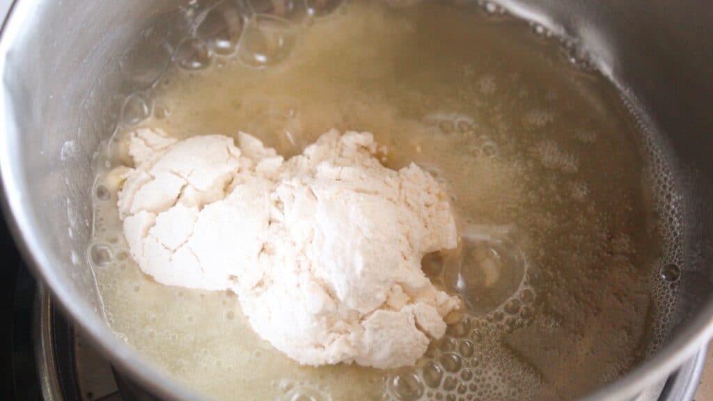 Bone Broth Gravy Flour added to melted tallow in a saucepan to start bone broth gravy.