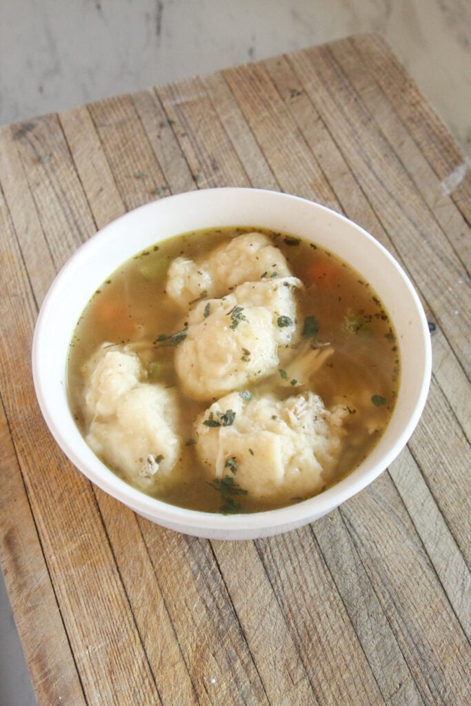 healthy chicken and dumplings finished soup bowl