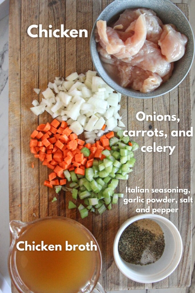 Ingredients for healthy chicken and dumplings recipe laid out on a kitchen counter