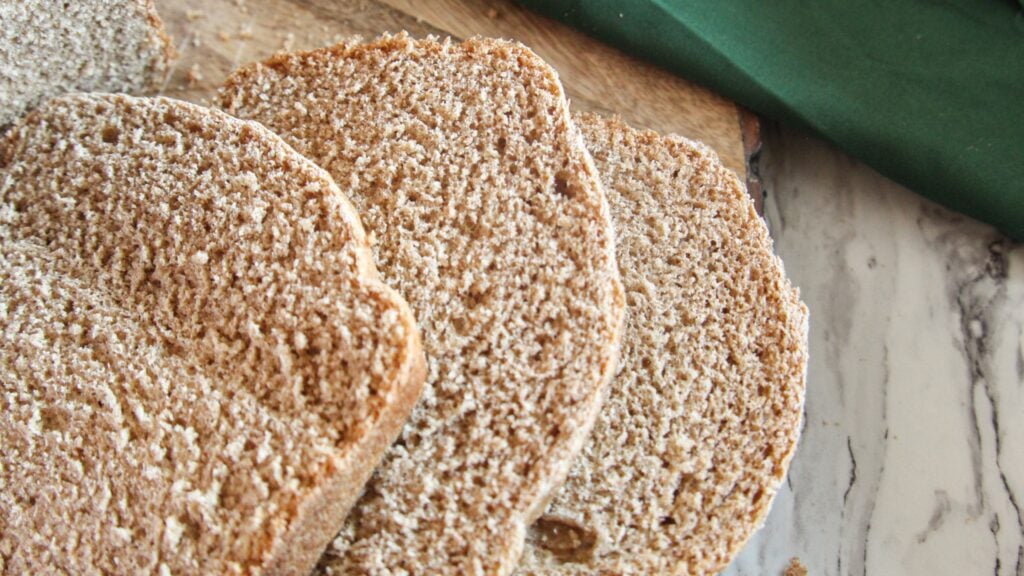 Close-up of sliced whole wheat bread showing soft texture