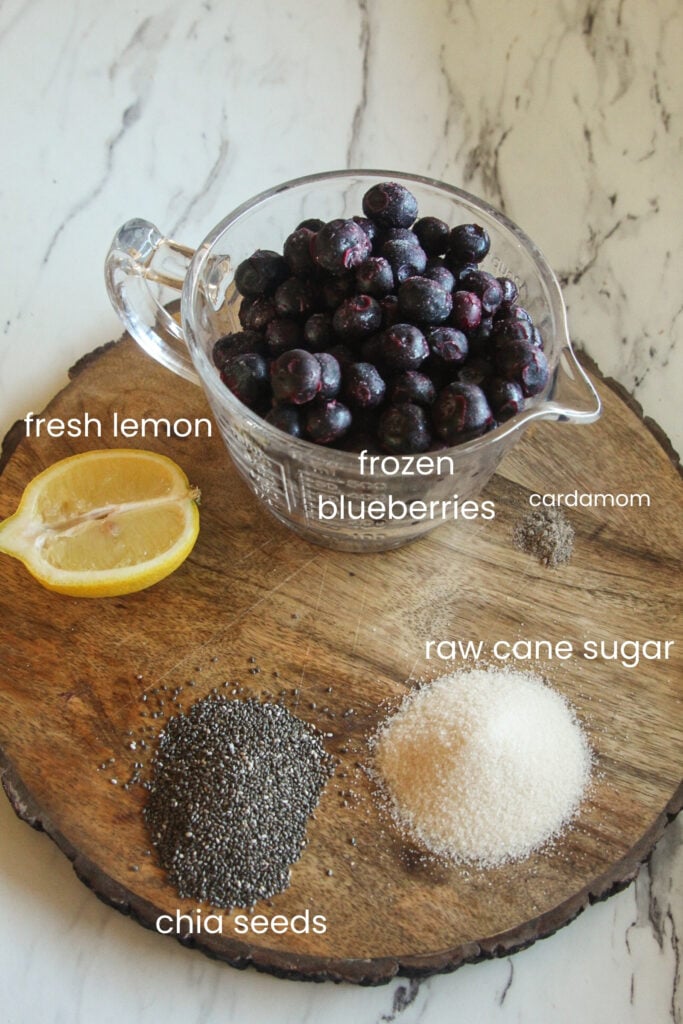 Healthy blueberry chia jam ingredients including blueberries chia seeds lemon and sugar